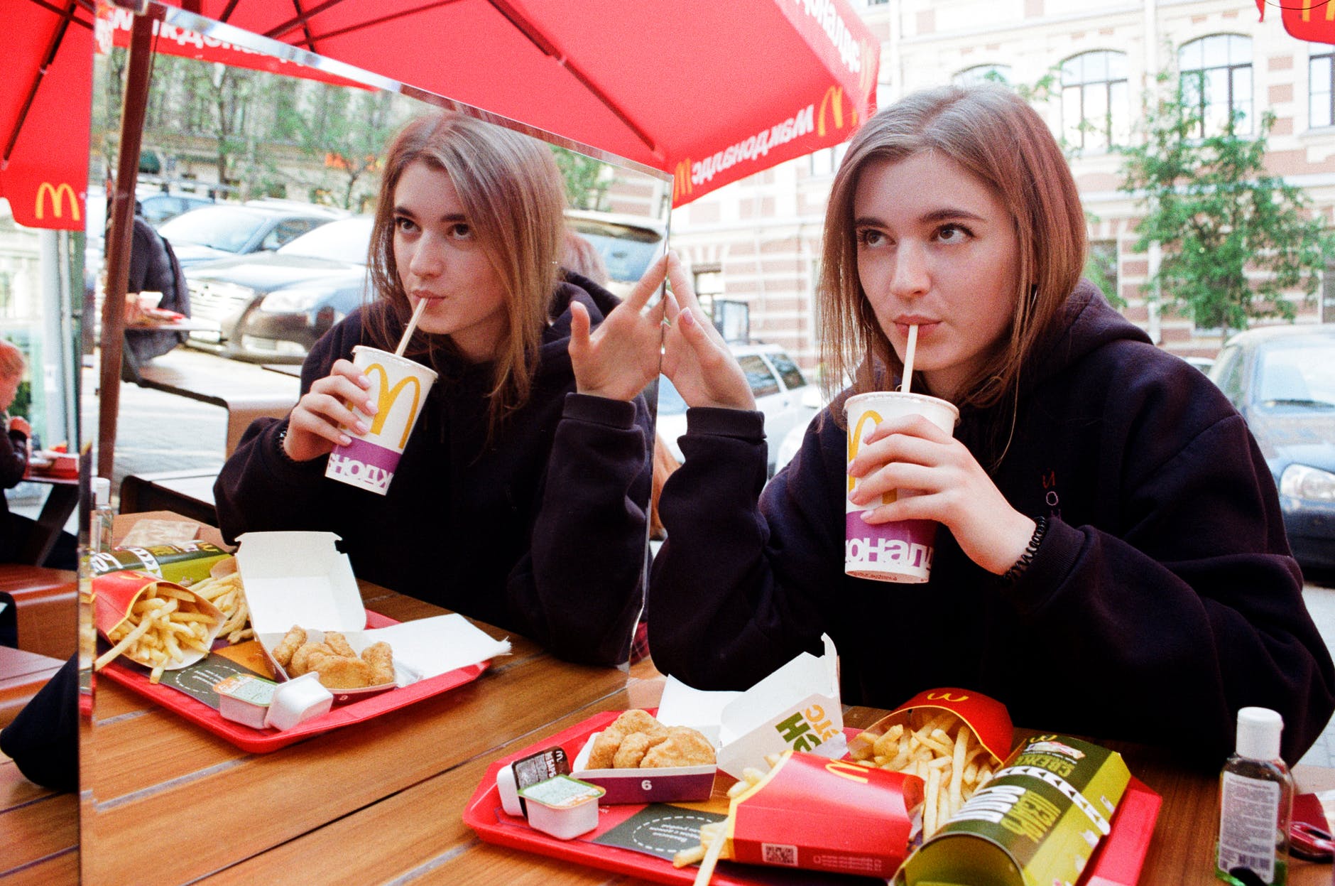 Girl eating in Mcdonalds