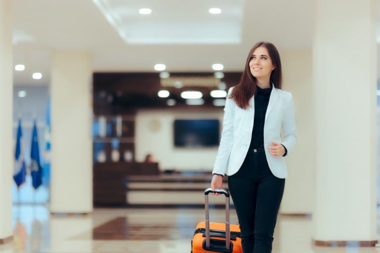 woman carrying luggage
